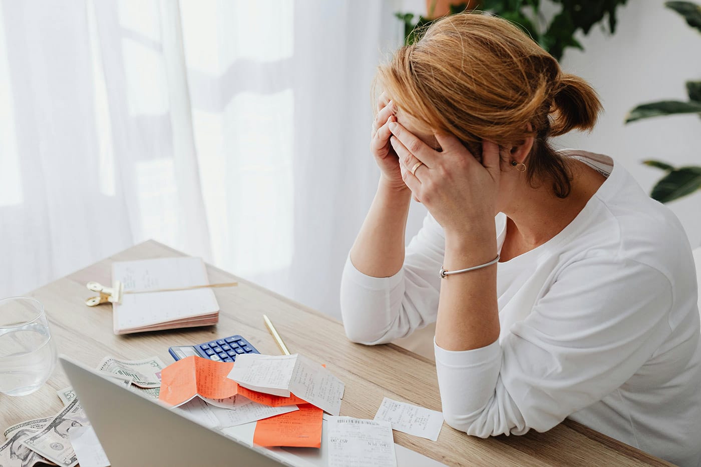 A small business owner looking stressed