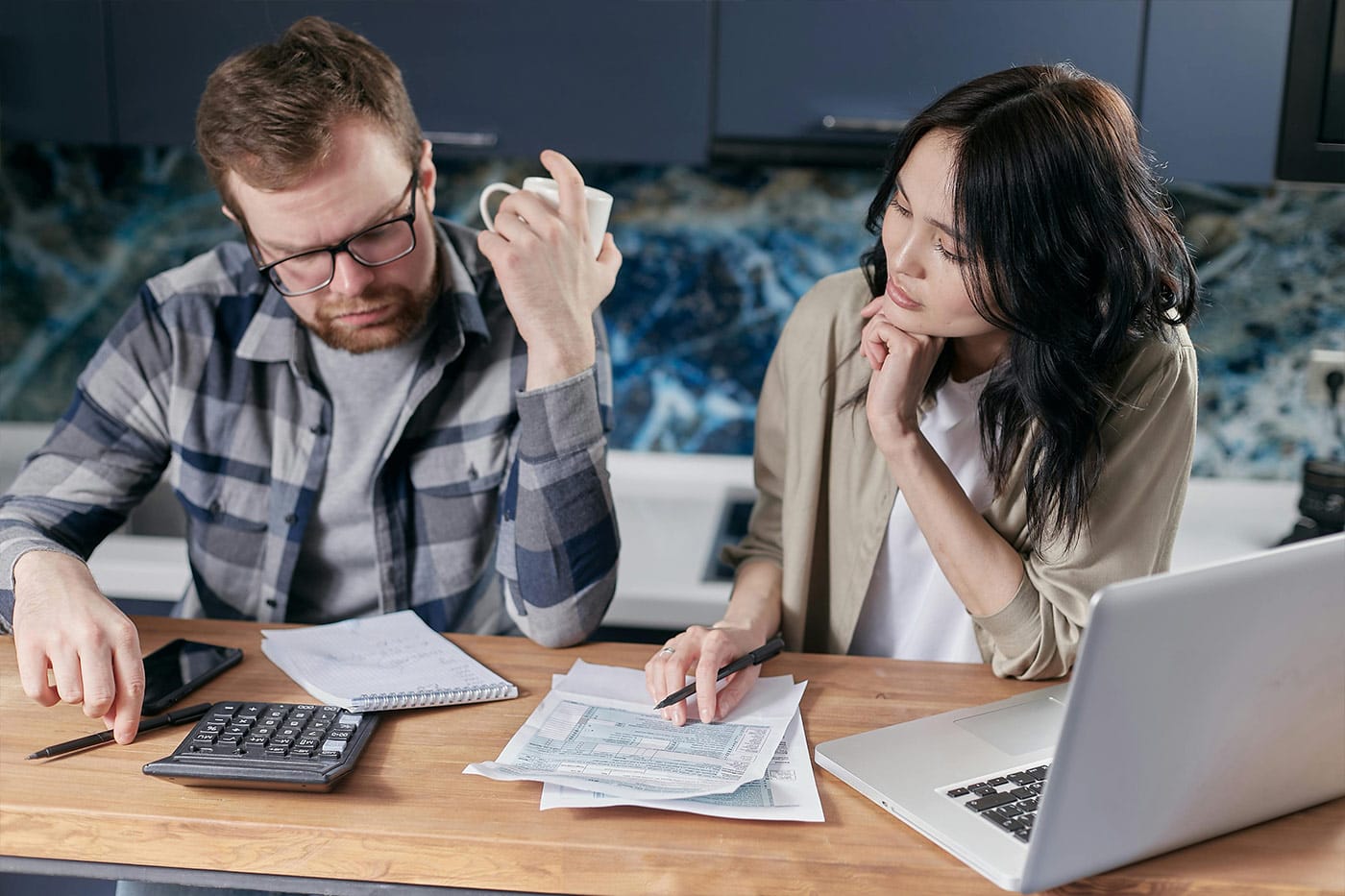 Two people reviewing paperwork