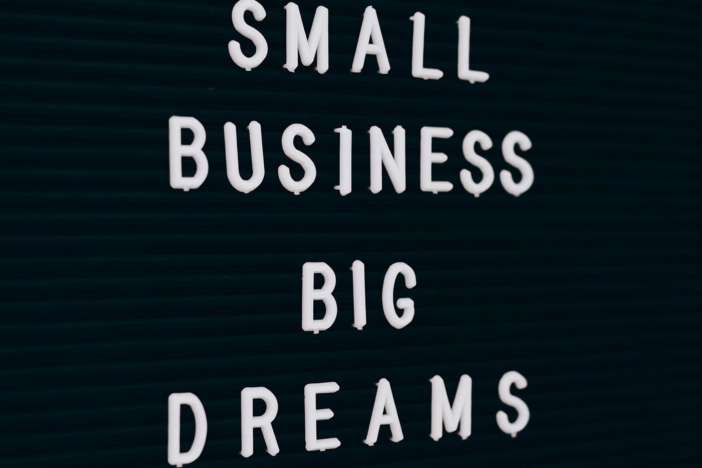 Text on a board that says Small Business Big Dreams